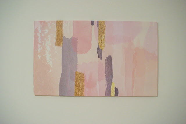 Completed framed and displayed gold, pink and grey canvas.