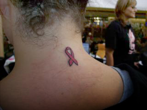 in Margaret Menzie's pink ribbon tattoo at Boardwalk Ink Thursday