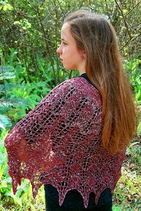 http://www.ravelry.com/patterns/library/petit-allegro-lace-ponchette---poncho