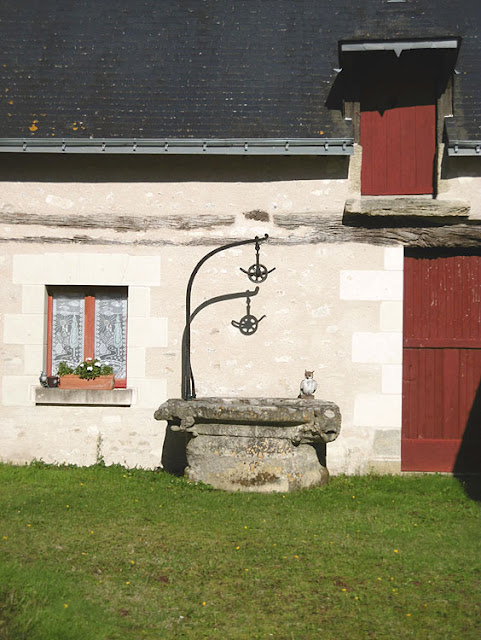 Well in a garden, Sainte Catherine de Fierbois, Indre et Loire, France. Photo by Loire Valley Time Travel.