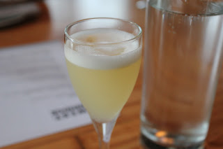 Grapefruit-infused Pisco sour at West Bridge, Cambridge, Mass.