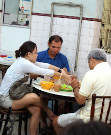 Hainanese Kopi Time!<br>For close to a hundred years -- the late-1800s to early-1980s -- the local coffee shop, or 'kopitiam' in Chinese dialect, enjoyed immense unbroken popularity. The people who owned and ran them were predominantly from Hainan, a tiny island off Southern China. The coffee shop therefore came to be known as the Hainanese kopitiam.