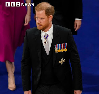 Prince Harry attends his father's Coronation