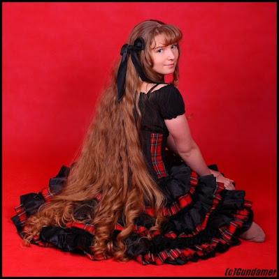 dating Model Showing Off Her Floor Length Hair