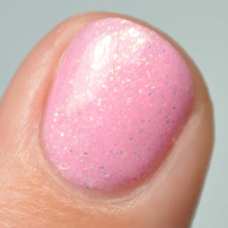 pink nail polish with iridescent glitter