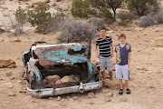 . who like many boys before them enjoyed pummeling this poor old car .