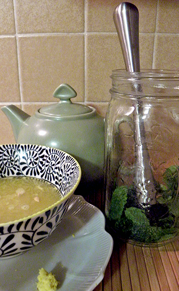 Teapot, Muddled Mint in Mason Jar, Squeezed citrus and grated ginger