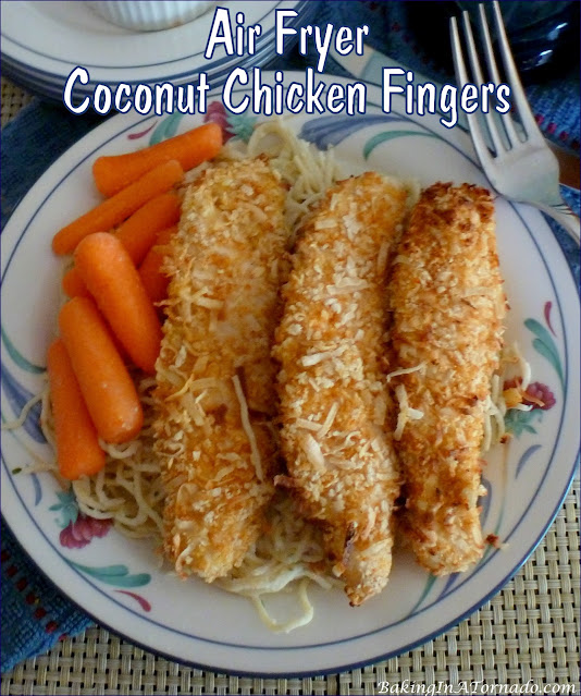 Air Fryer Coconut Chicken Fingers, these chicken fingers have a hint of orange and are air fried for a healthier crunch. | recipe developed by www.BakingInATornado.com | #recipe #dinner