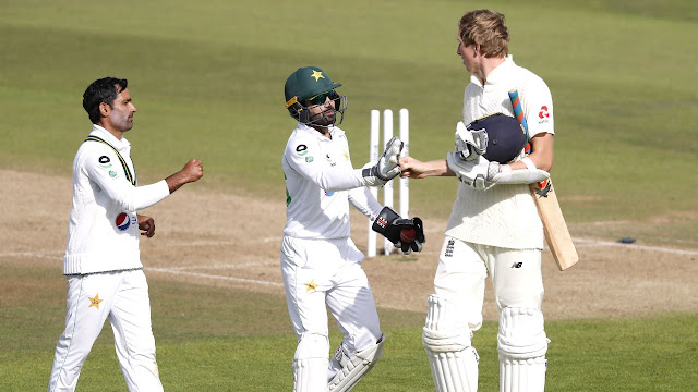 Pakistan's humiliating defeat at the hands of England was averted for a day.