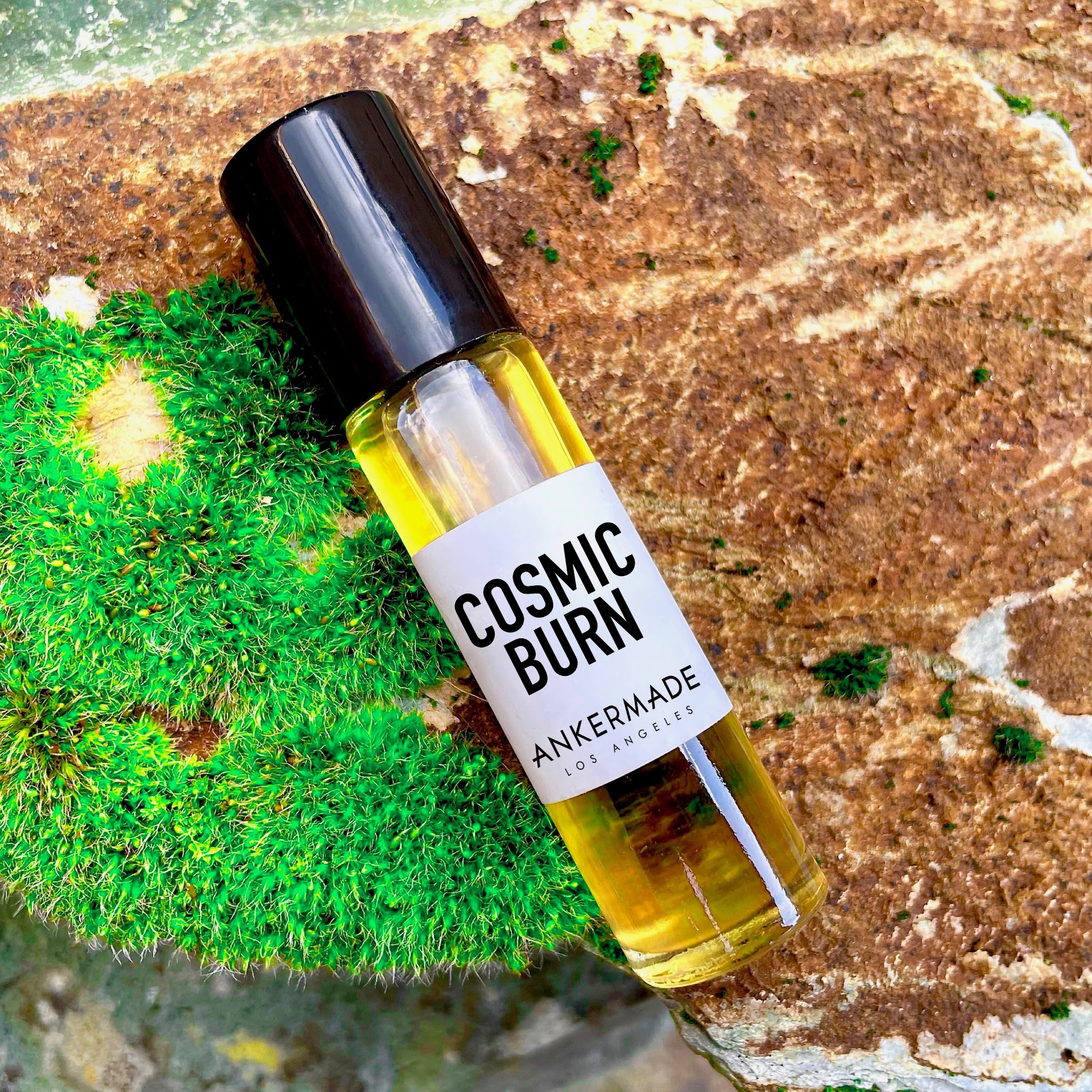 A bottle of Cosmic Burn, a perfume from Ankermade