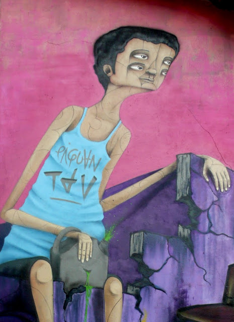 piguan graffiti street art in patronato, santiago de chile