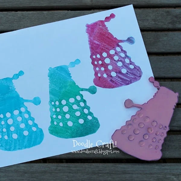 Carve a dalek out of rubber to make a red rubber stamp for card making.