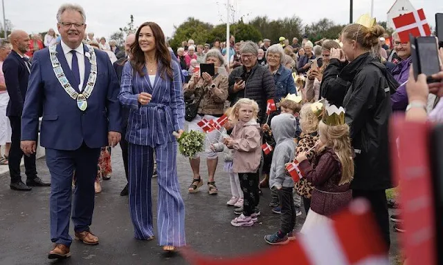 Crown Princess Mary wore a new blue belted stripe linen blend blazer by Ralph Lauren