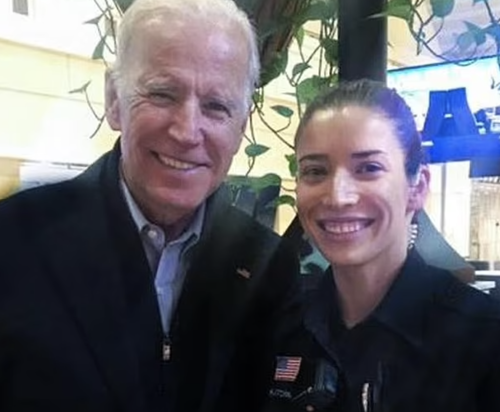 It's a small world: Biden with Minneapolis-St. Paul Airport Police Officer Anne Kathmark, who led the initial investigation of Brinton's theft