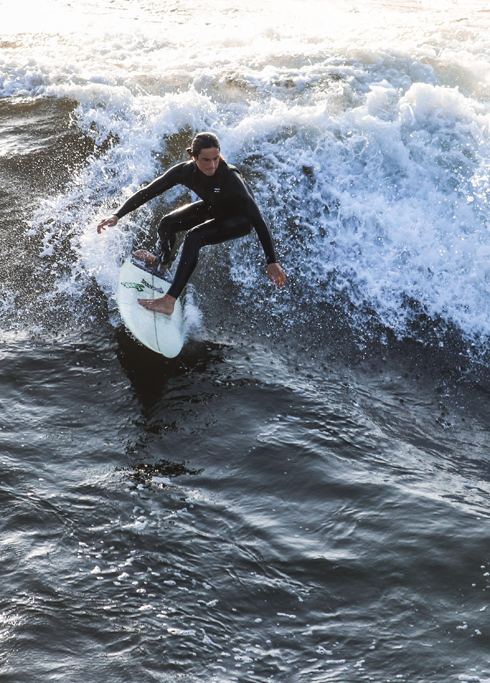 Manhattan Beach Pier Surfers Surfing California