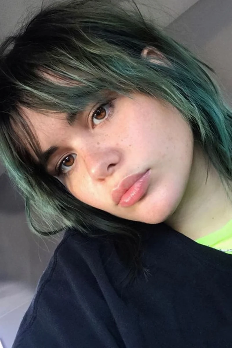 a selfie of actress Barbie Ferreira with Shaggy Mullet with Long Bangs