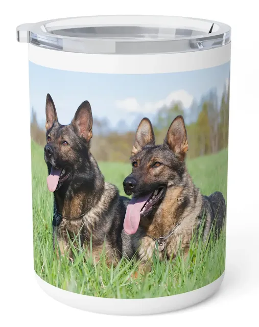 Insulated Stainless Steel Coffee Mug With Two Giant Black Sable Working Line German Shepherds Lying on the Grass Leaving Tongue Out
