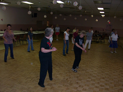 Electric Slide line dancing on Christmas music