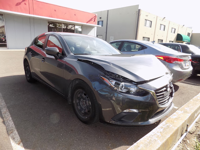 2016 Mazda3-Before work was done at Almost Everything Autobody