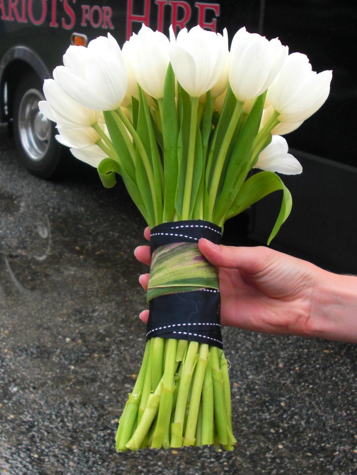 Here we have a modern spring bouquet featuring white tulips