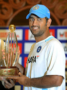 dhoni with cup. dhoni with cup (dhoni with cup )