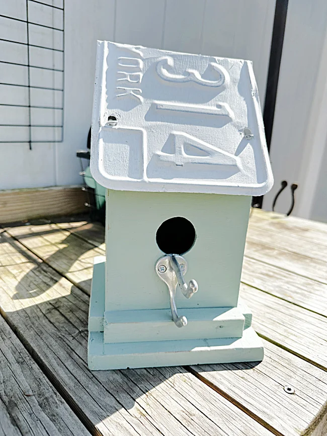 birdhouse on outdoor table