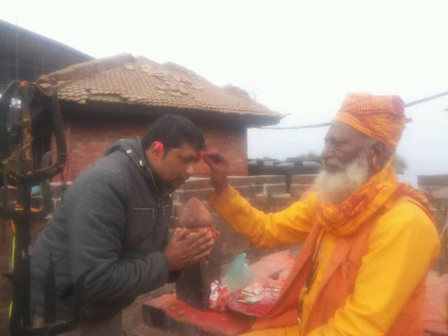 Blessing from holy man at the Gorkhanath temple Gorkha