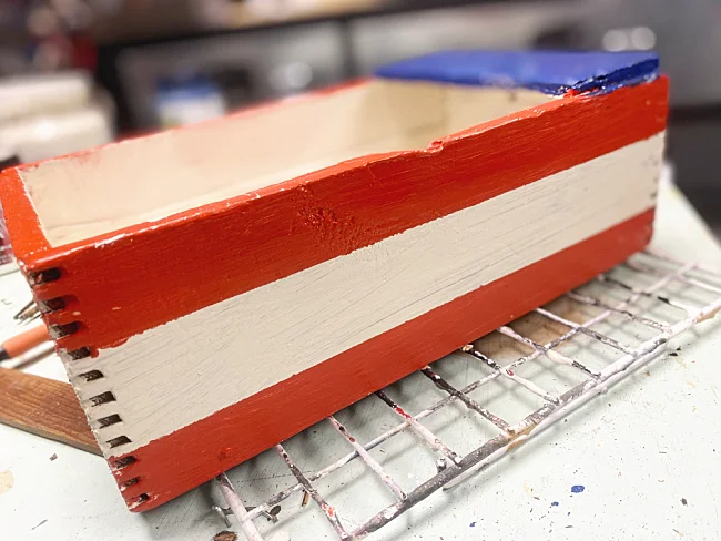 red and white stripes on crate