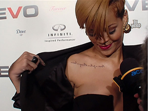 Rihanna Chest Text Motto Tattoo