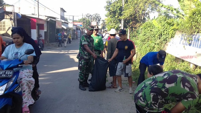 Babinsa Koramil 06/Cimanggis Bersihkan Rumput Liar 