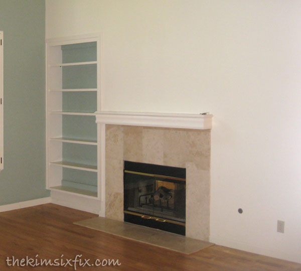 Living room fireplace before