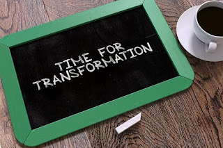 A blackboard with time for transformation written on it