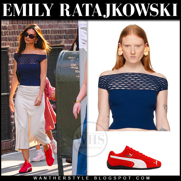 Emily Ratajkowski in blue off shoulder top, white skirt and red sneakers