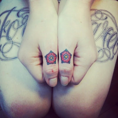 finger tattoos