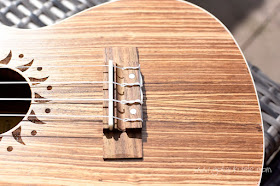 Caramel CC101A Zebrawood Ukulele bridge