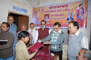 Donate sweater by NGO Shri radhashrya charitable trust in mathura