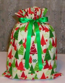 fabric gift bags with Christmas trees
