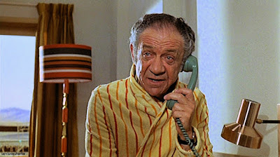 carry on abroad, carry on, film, movie, sid james, comedy, british, 1972, 1970s, fun, humour, innuendo, actor, hotel, room, lamp shade, interior, dressing gown, fashion