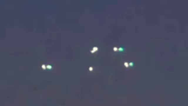 9 UFOs Hovering Over City possible it's Marfa in West Texas US.