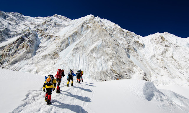 climbing to top of the Everest