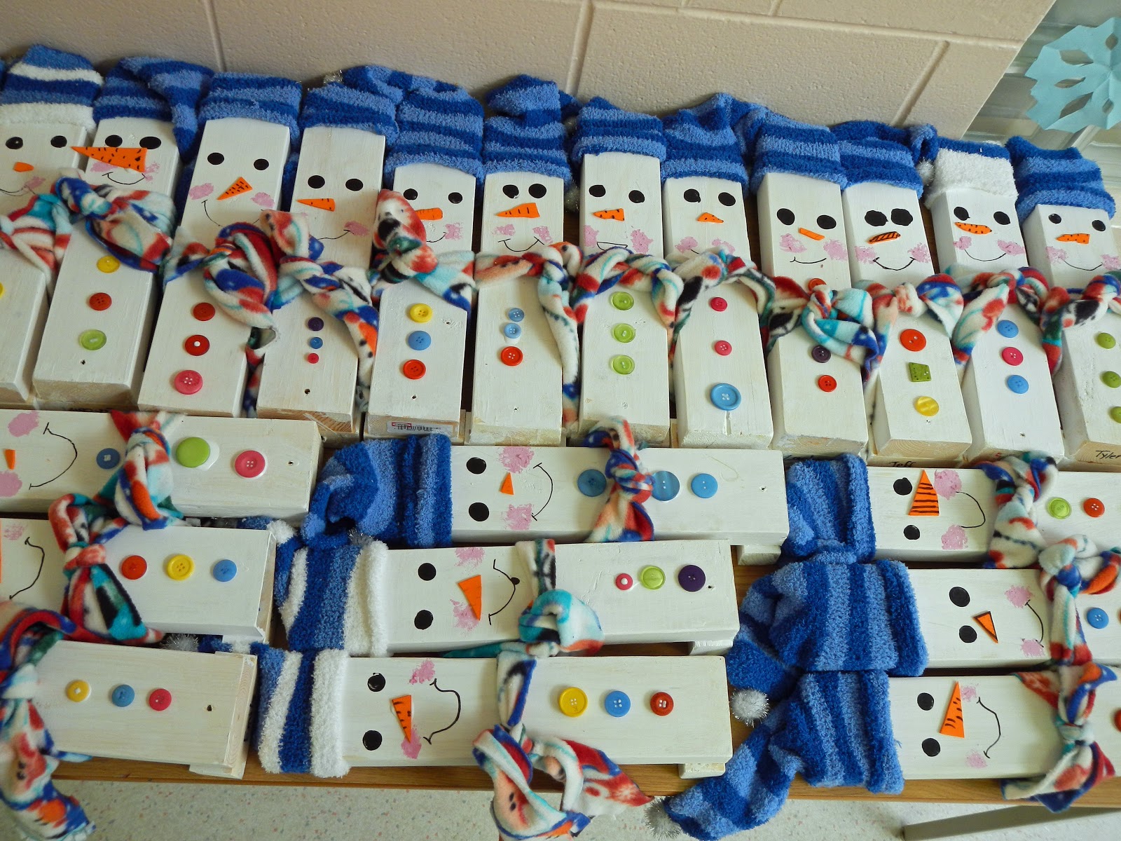 Grade 4 made these adorable wood Snowmen.