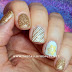 Nail Art of the Day: Gold Snowflake on Glitter Gel Nails