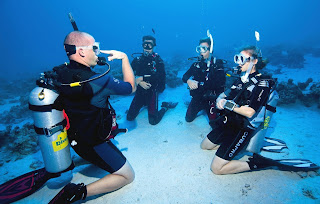 four scuba diver underwater
