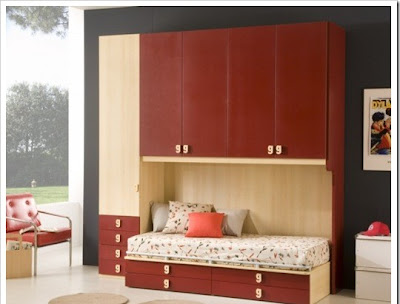 stylish kids room for girls decorated in red, red cabinets and red chair