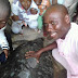 Excited Residents Pose With Huge Turtle After Its Capture In Bayelsa State (Photos)