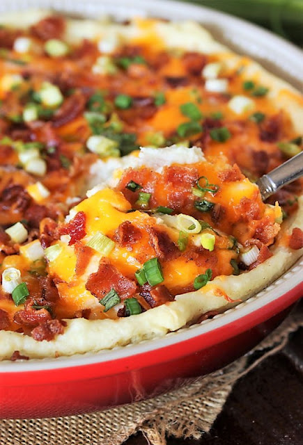 Baking Dish of Make-Ahead Loaded Mashed Potatoes Image