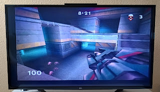 Turok Rage Wars running on the TV on the map Hopeless with a Rocket Launcher