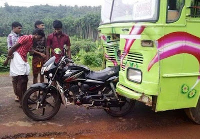 Buss collides with motorcycle