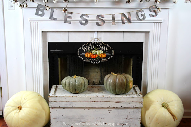 Cotton garland, galvanized banner, pumpkins, pallet art fall mantel