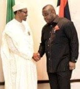 See the difference: Senator Bassey Albert greeting Pres. Buhari vs Bukola Saraki  1